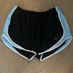 Black and light blue Nike tempo running shorts